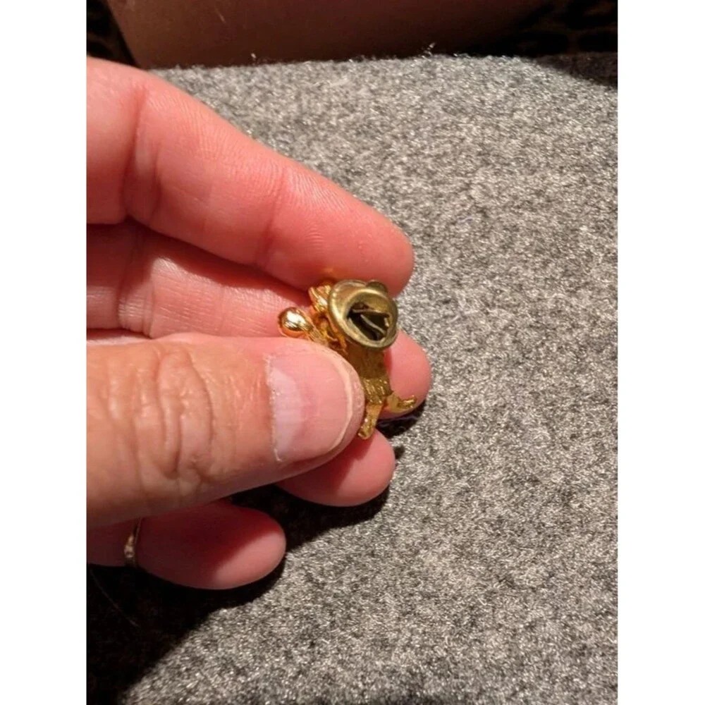 Gold and CZ clown pen or Thai tech?